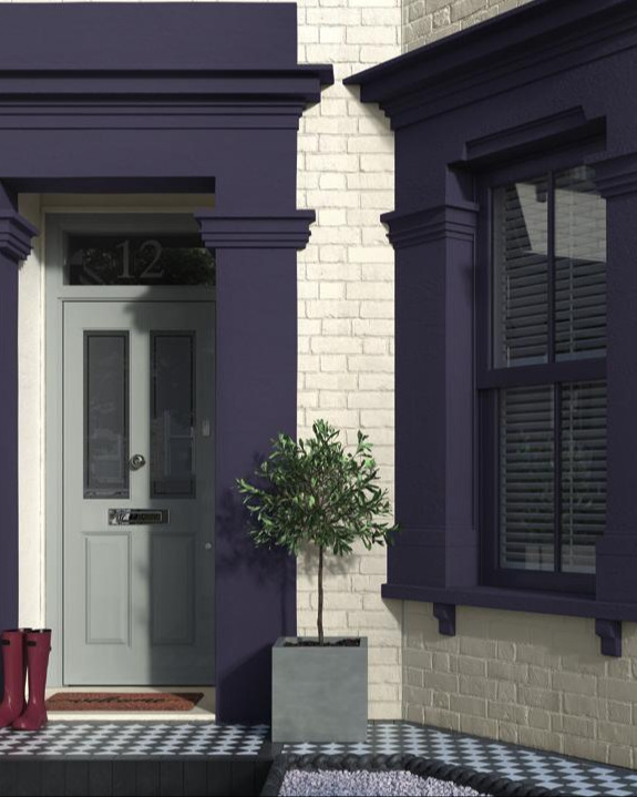 A victorian bay fronted house with plum tones